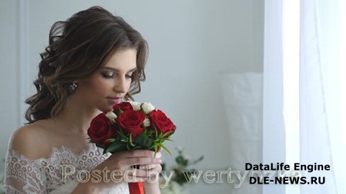 Beautiful Bride Smelling Wedding Bouquet