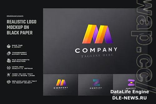 Realistic logo mockup on black pressed paper PSD