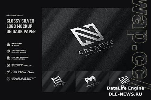 Glossy Silver Logo Mockup on Dark Paper PSD